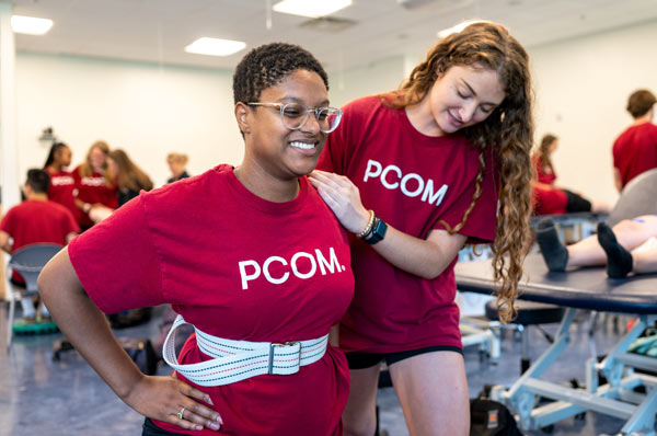 DPT students practice physical therapy techniques