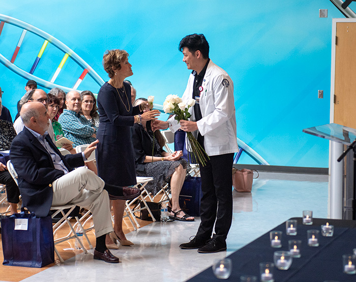 White roses were presented to donors' children as a special thank you in honor of Mother's Day.