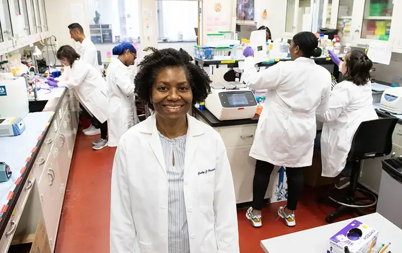 Faculty and students busy at work in a PCOM research laboratory