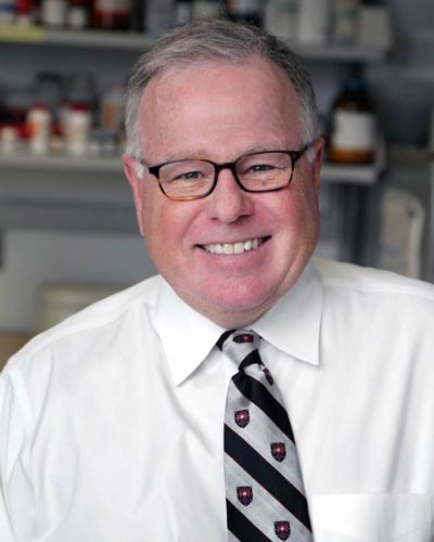 Headshot photograph of William Douglas Figg, Sr., PharmD, MBA in a pharmacy lab