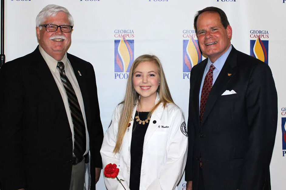 Dr. William Craver, Caitlin Mueller and Bryan Ginn