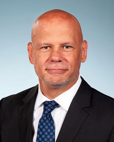 Professional headshot of Dr. Gregory McDonald