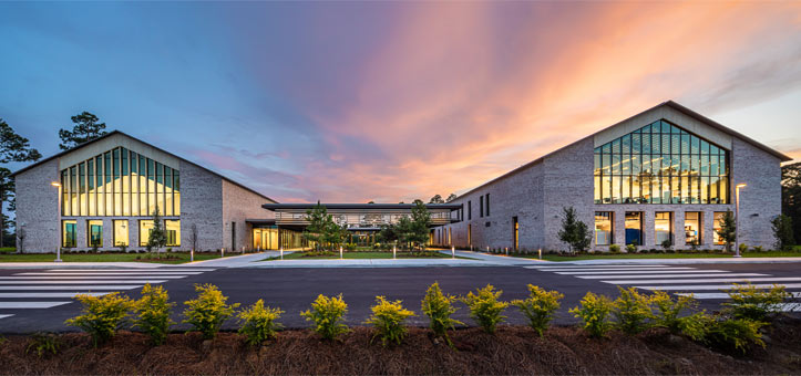 Exterior view of PCOM South Georgia campus at sunset